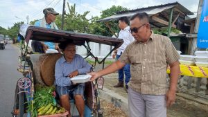 AJOI Metro Bagikan Ratusan Nasi Kota