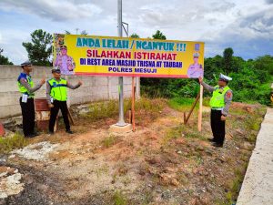 Jelang Libur Nataru, Satlantas Polres Mesuji Pasang Spanduk Himbauan