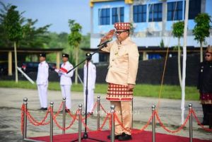 Pj. Bupati Mesuji Jadi Irup Peringatan Hardiknas dan Hari Otonomi Daerah ke-27