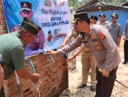 Polres Lamteng Serahkan Satu Set Bantuan Sumur Bor Kepada Warga Kampung Notoharjo